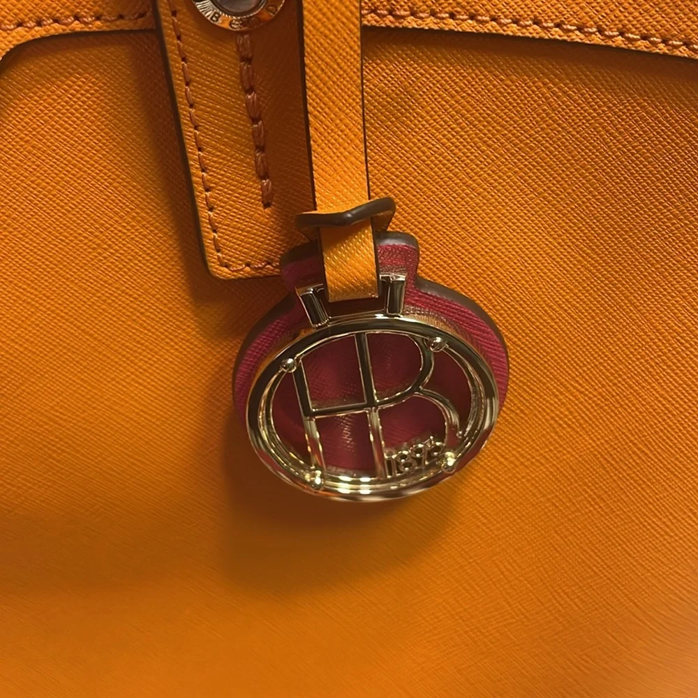 henri bendel orange zip